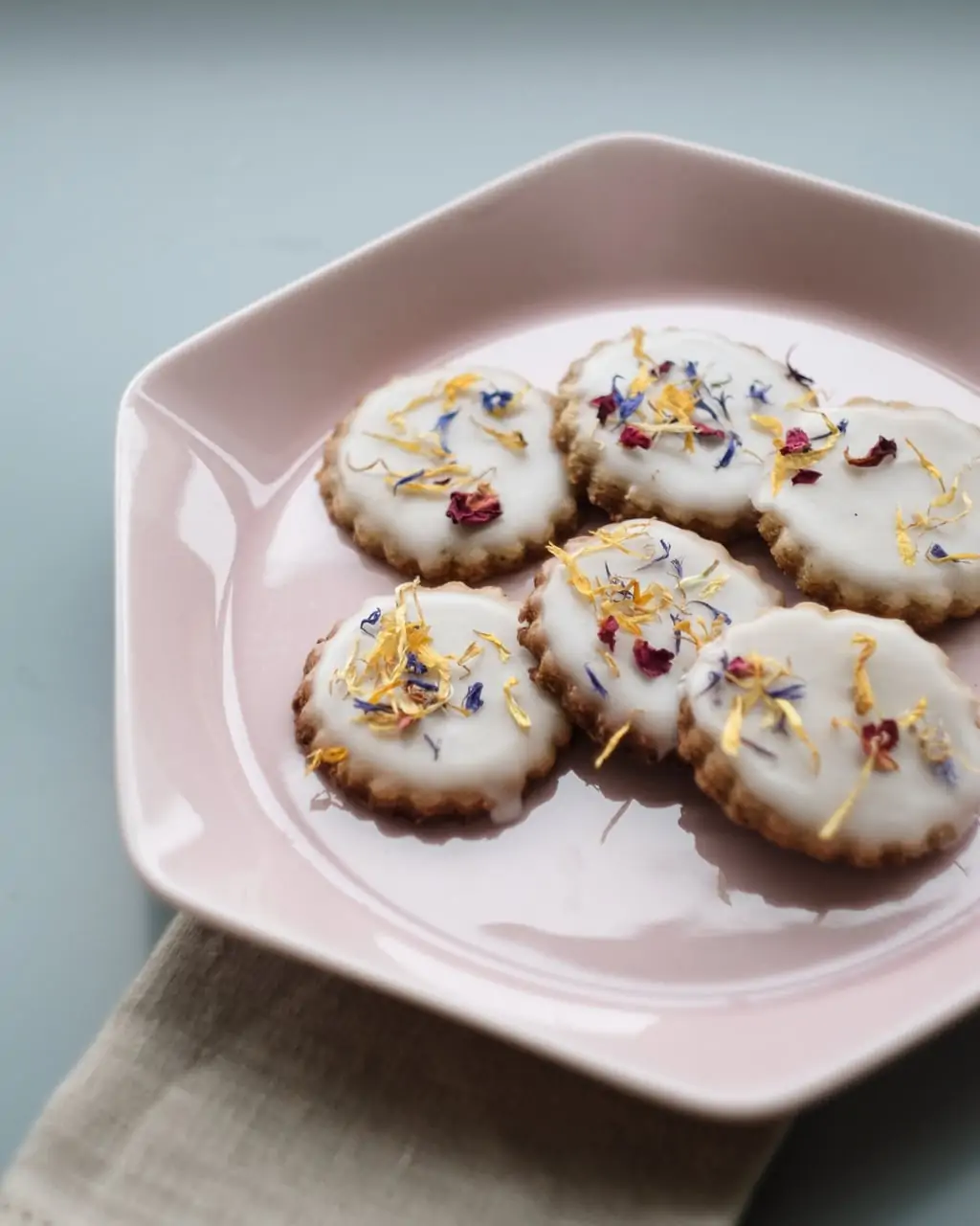 orange almond xmas cookies on plate