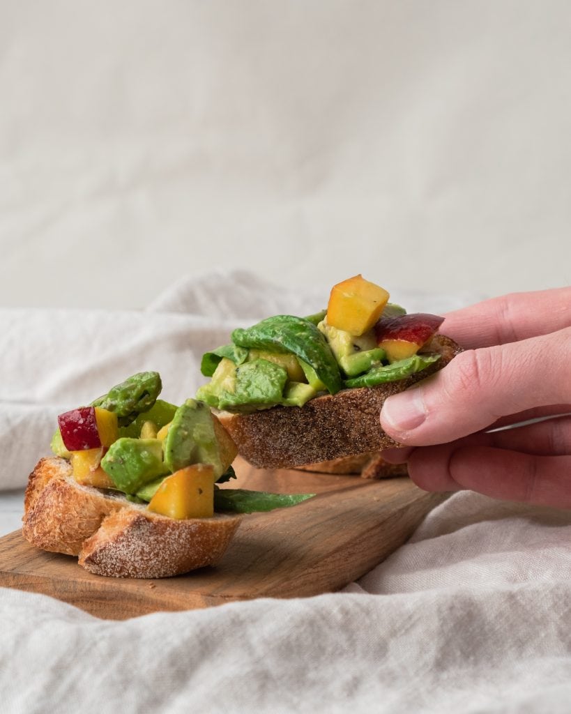 asparagus nectarine bruschetta hand