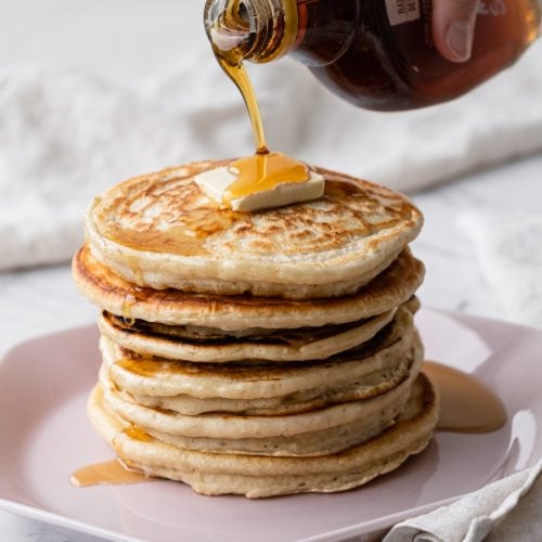 pancakes pouring maple syrup