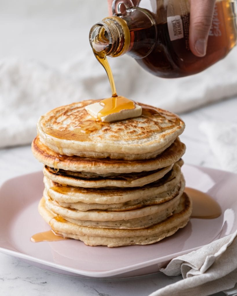 pancakes pouring maple syrup