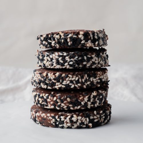 sesame chocolate cookies stack close up