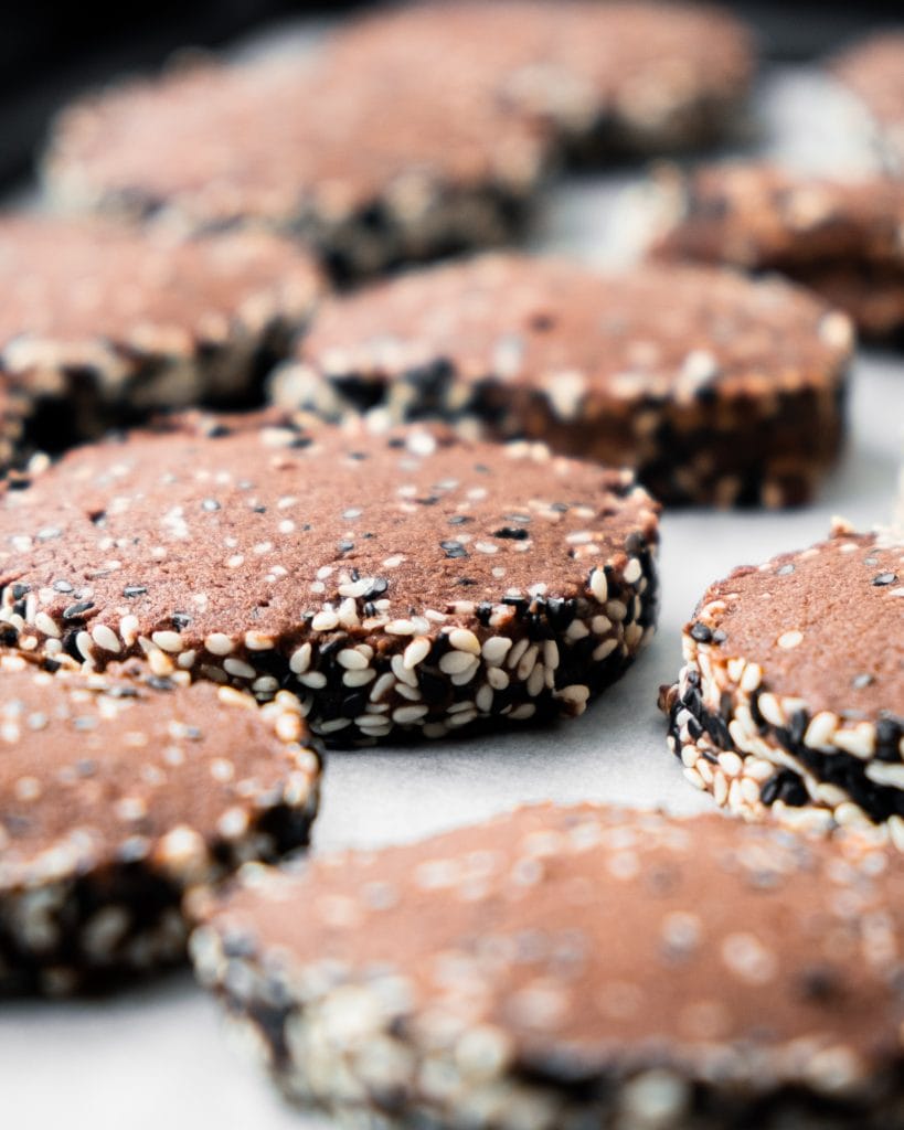 sesame chocolate cookies from side on tray