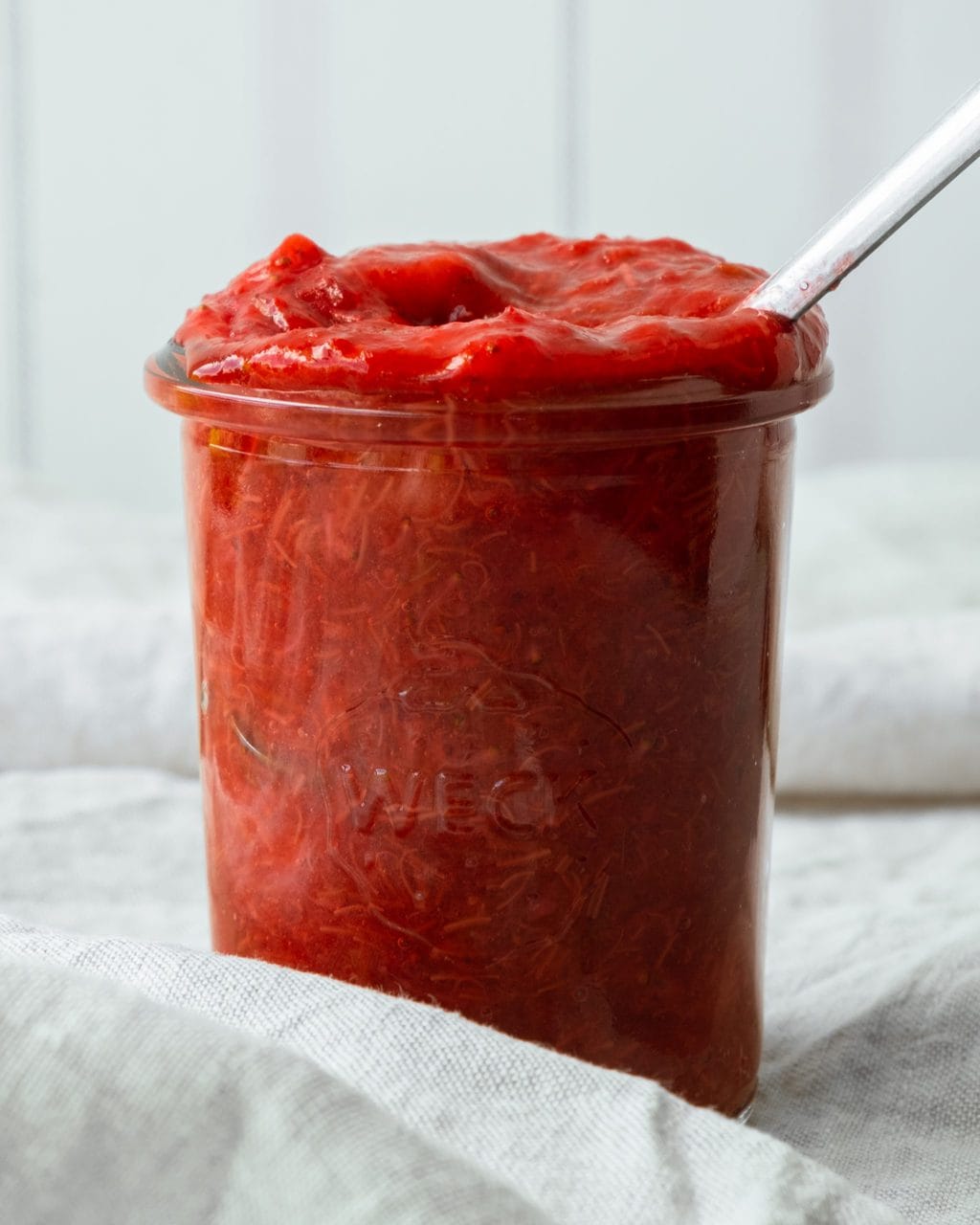 rhubarb strawberry compote with spoon