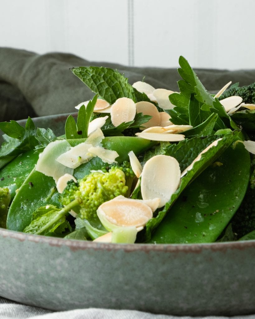 snow pea and broccoli salad from side close up