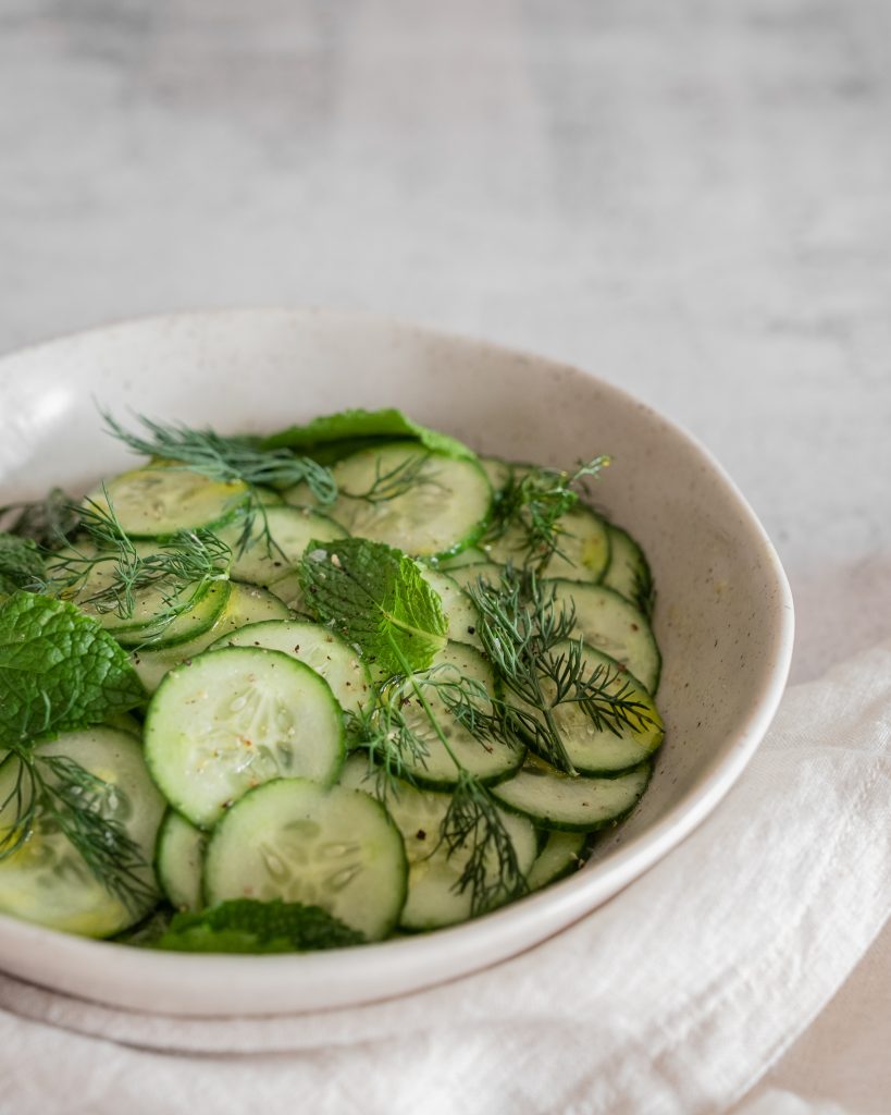 cucumber salad with mint and dill close up