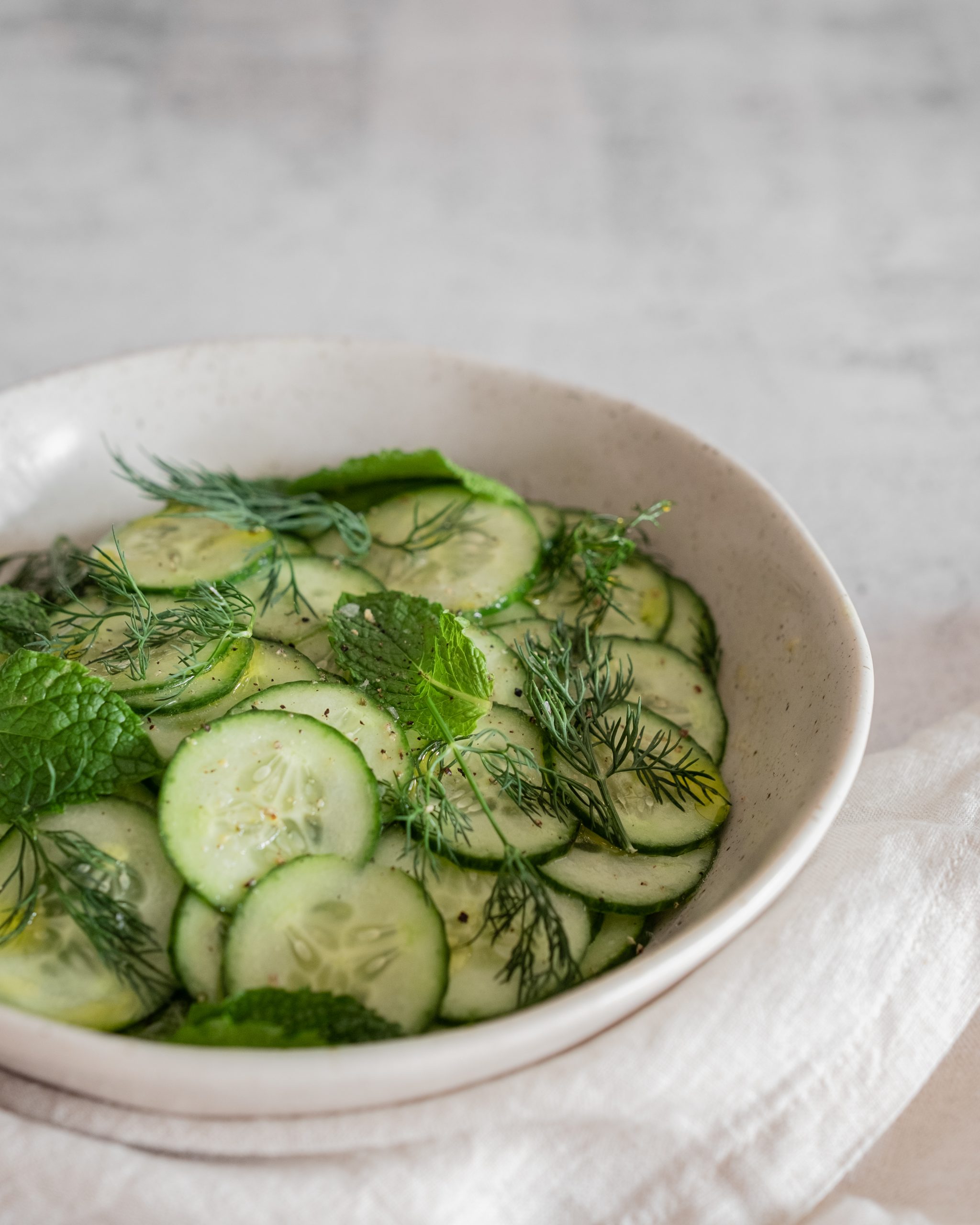 cucumber salad with mint and dill close up