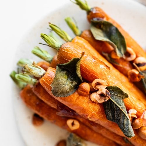 maple roasted carrot with sage from above close up